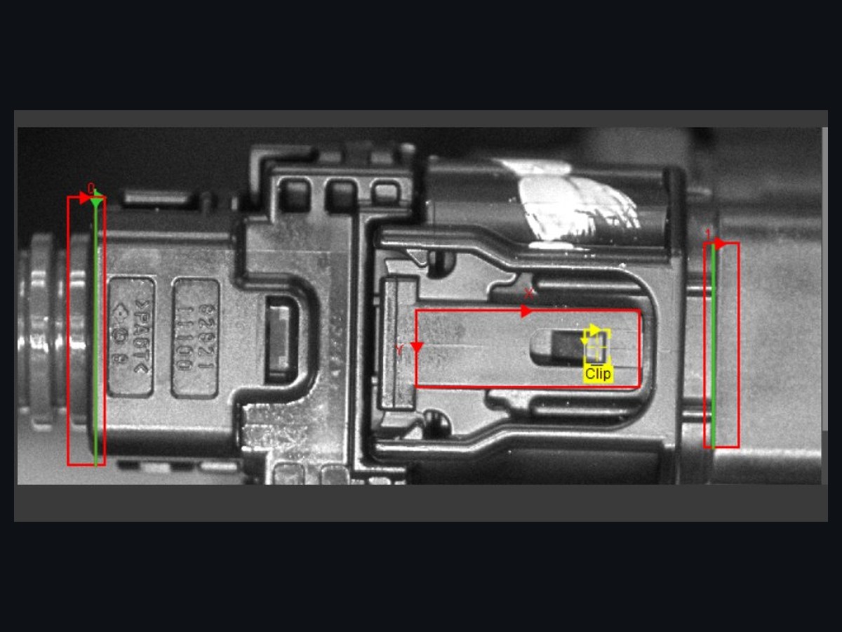 Vision inspection of the ECU connector with measurement overlays showing seating and clip