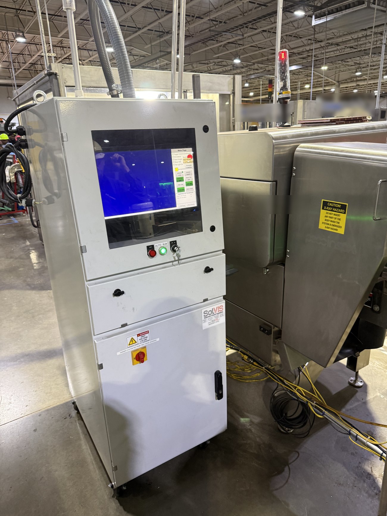 Controller cabinet on casters with an HMI, installed lineside