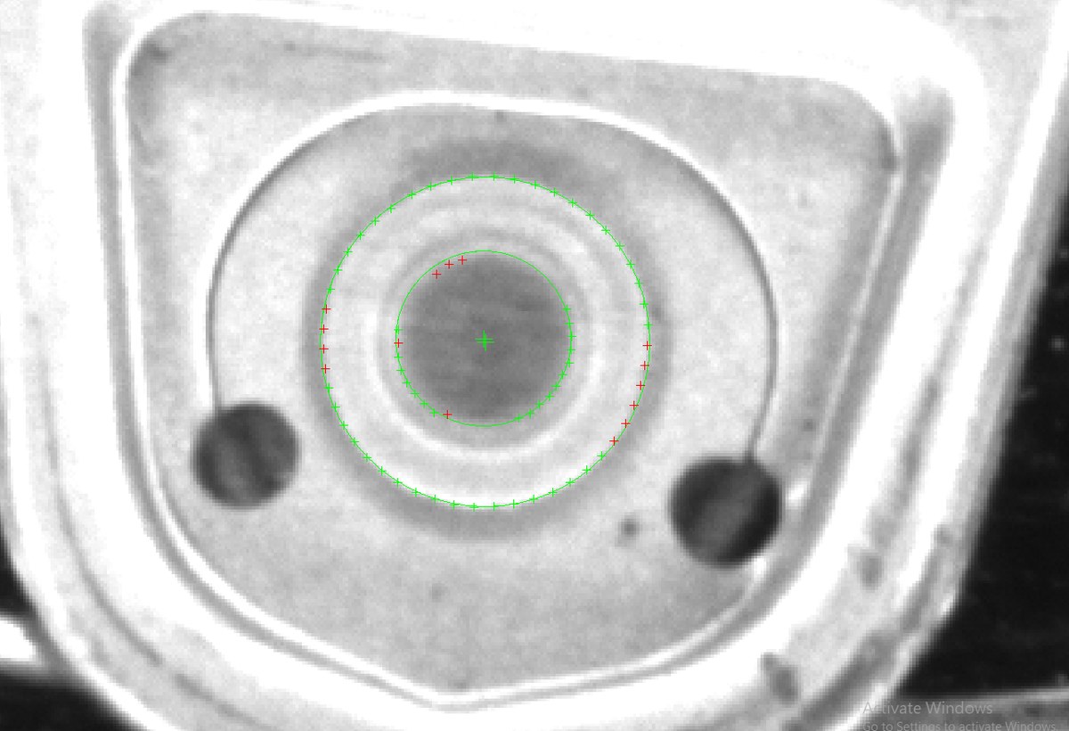 Vision inspection of a can end showing the opening rivet centered and passing