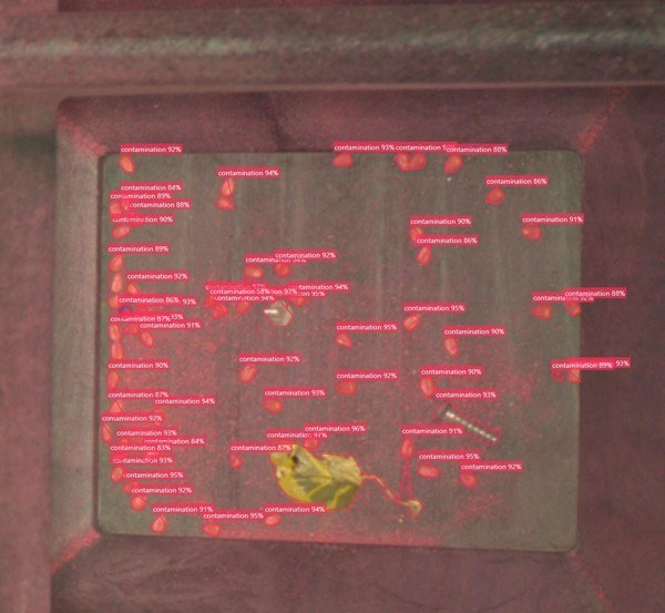 Camera view inside a probox with every contaminant outlined by the detection model