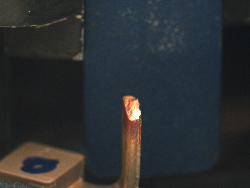 A copper lead with no weld bead formed on it at all