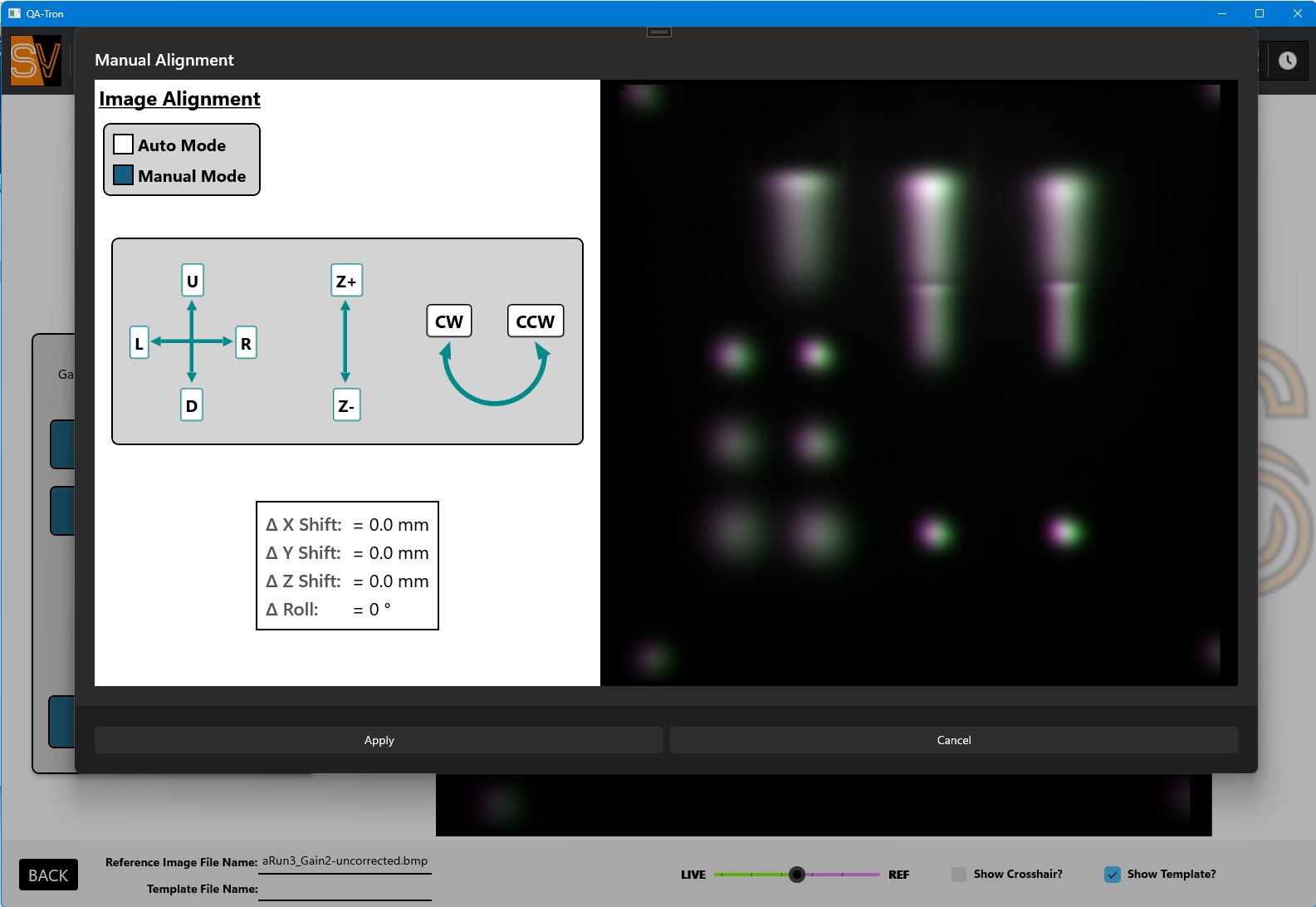 QA-Tron manual alignment dialog with up/down, left/right, Z, and roll controls, displayed X/Y/Z shift and roll values, and a magenta-green overlay of live versus reference images.